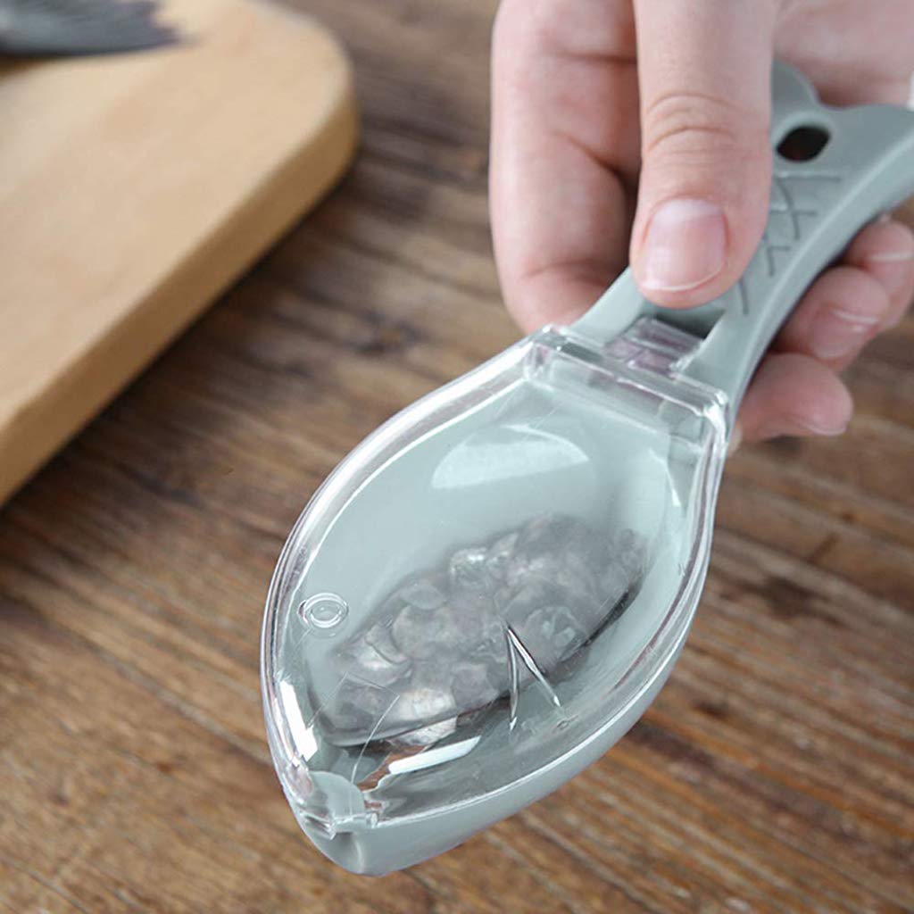 Ergonomic fish scale scraper and skin peeler for easy use. Ergonomic fish scale scraper and skin peeler for easy use.